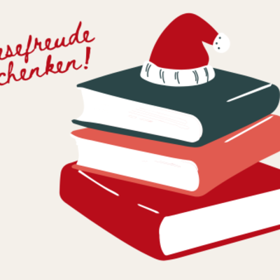 Lesefreude schenken. Bücherstapel mit Weihnachtsmütze